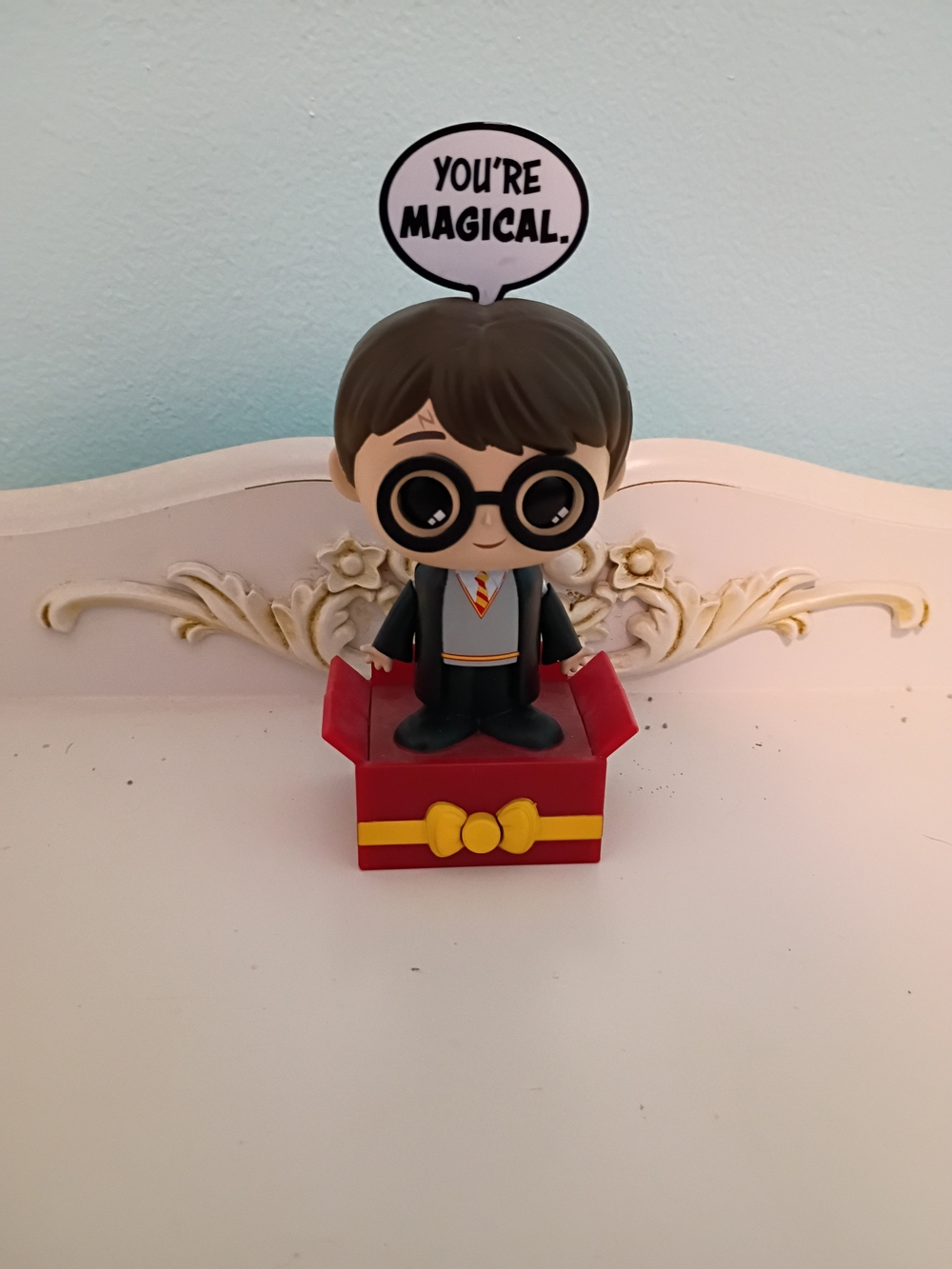 Funko Red Box Figure with Black Accents and Yellow Detail